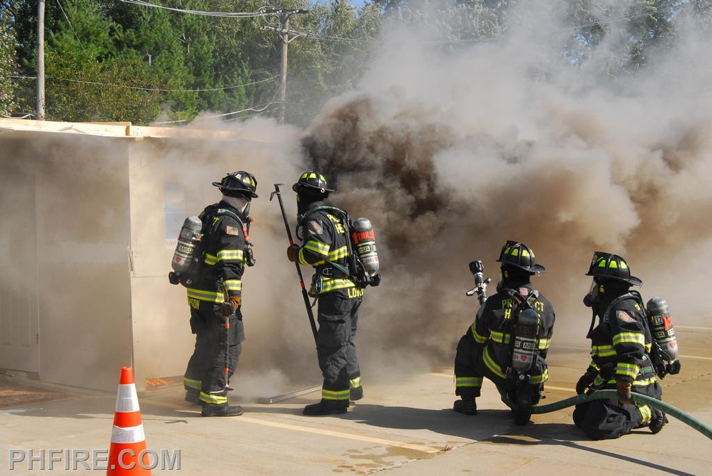 Demonstration of smoke detectors and the importance of fire sprinklers.  