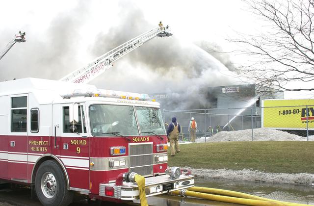 Action photo of fire at Semeria Imports